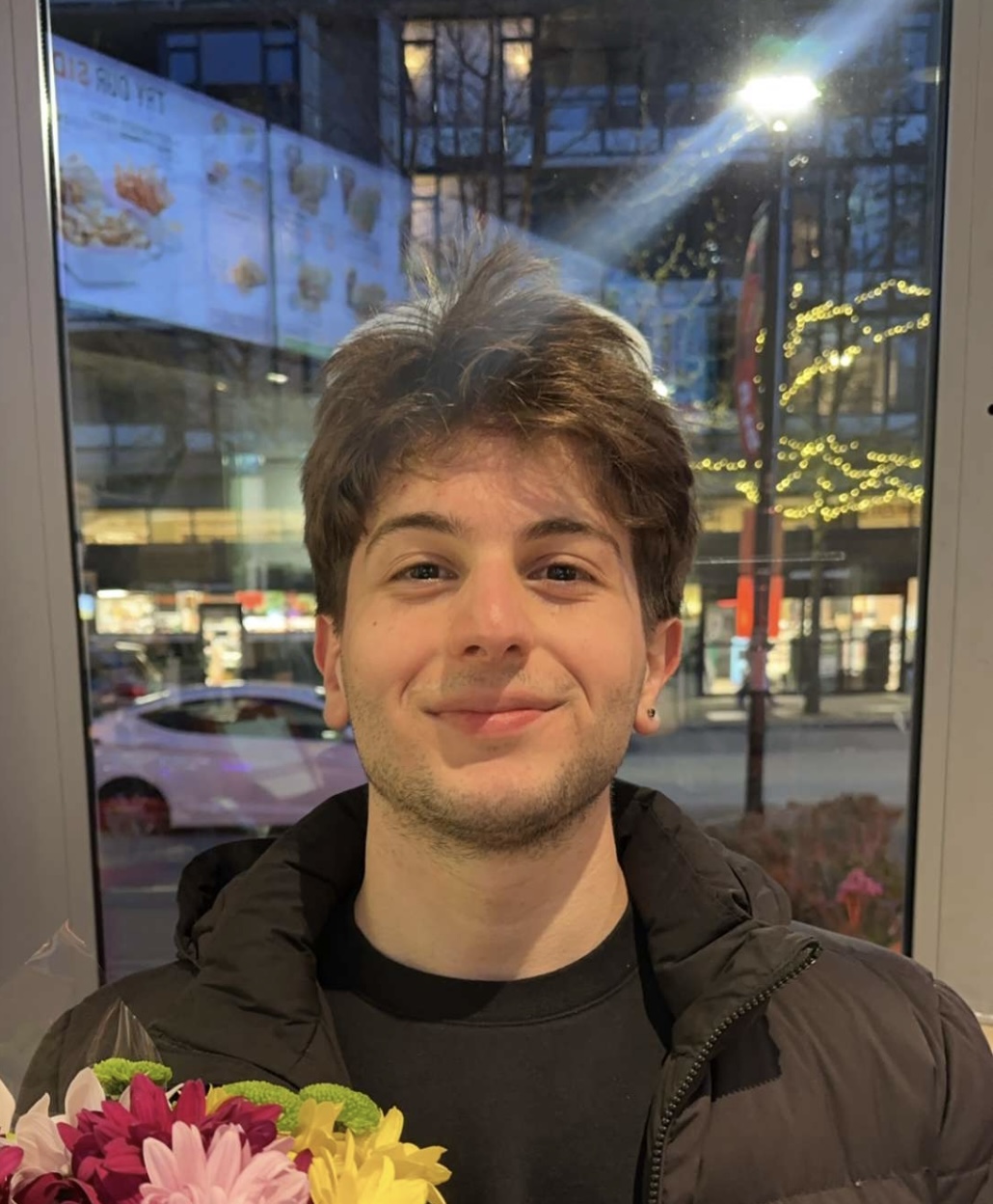 A portrait of Egemen Güney, student and developer.